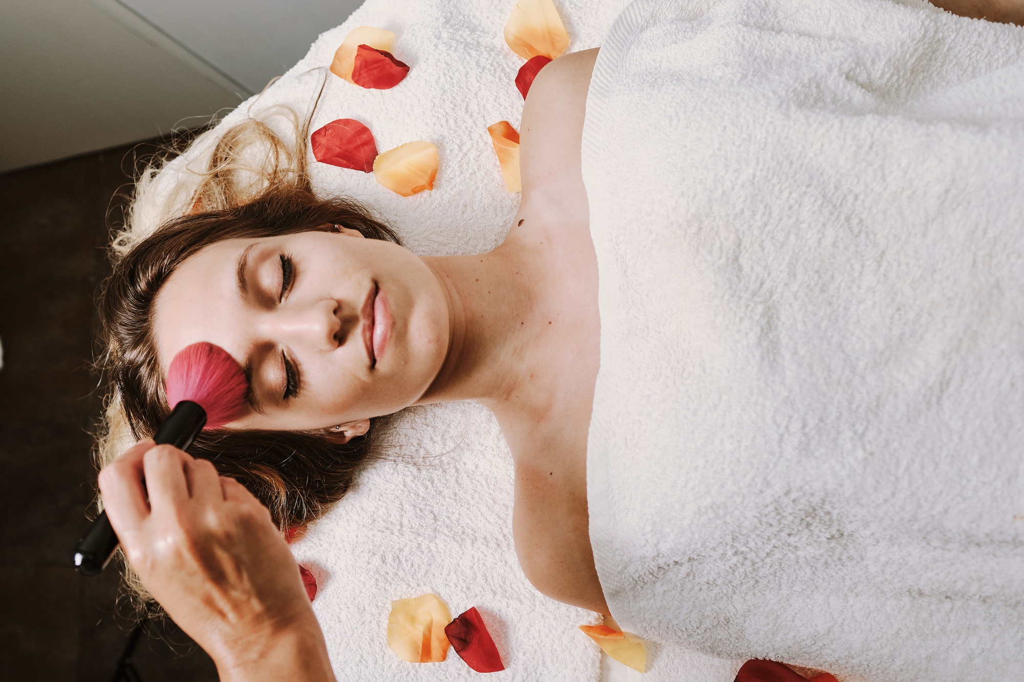 young woman make up at spa