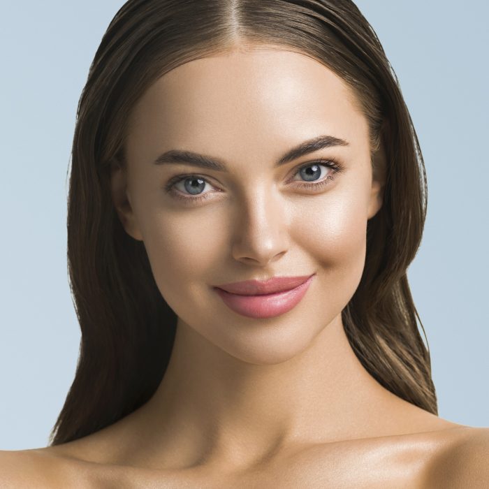 Young spa model face close up natural make up